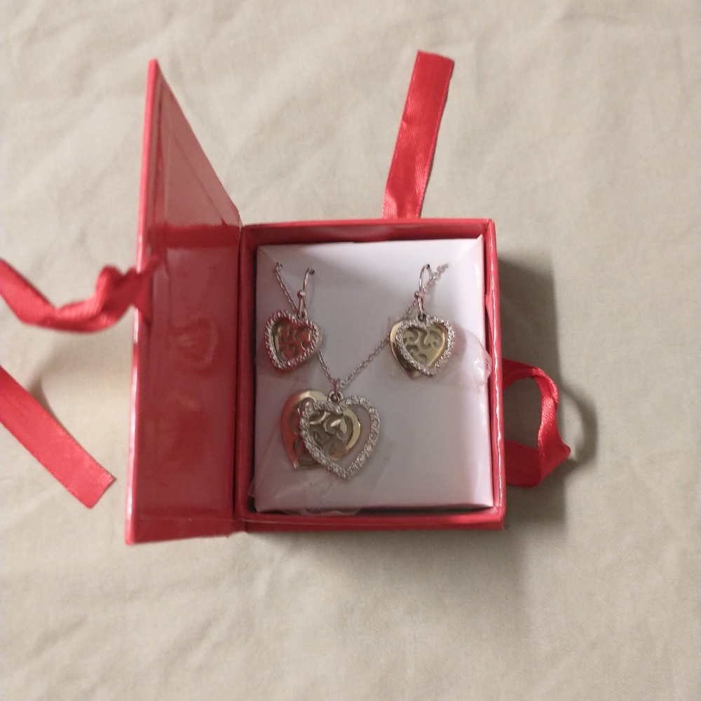Heart box necklace and earring sets.